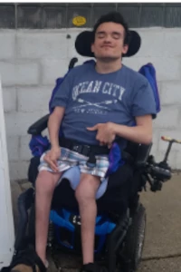 Robert a young man using a wheelchair